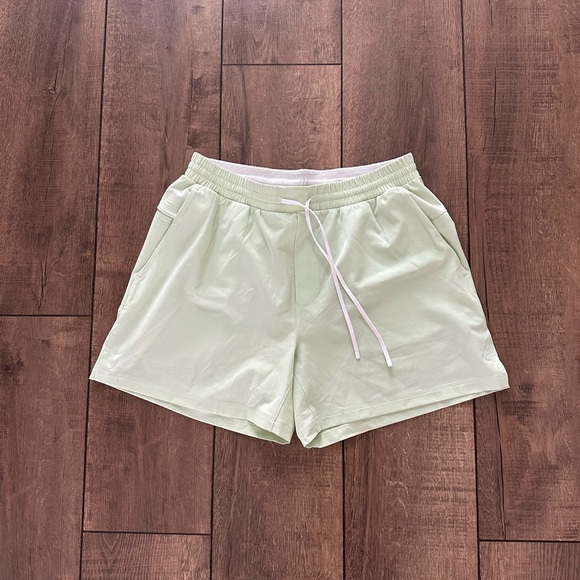 Lululemon pale yellow swim trunks in size Large